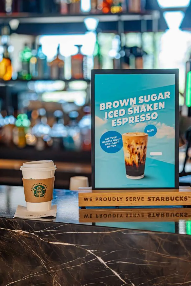 We Proudly Serve Starbucks